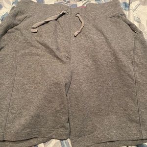 Grey knee-length athletic shorts